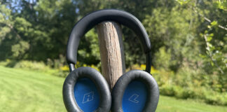 The Bose QuietComfort 2 headphones outside mounted on a pole showing the insides of the earcups.