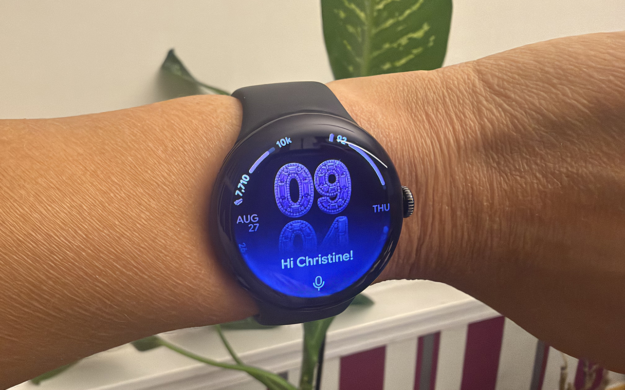 A Google Pixel Watch 5 on a wrist showing Gemini.