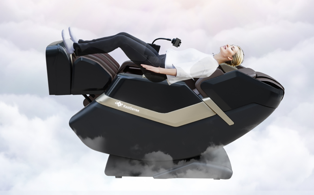 A woman lying back in a Kozisense heated massage chair with clouds in the background.