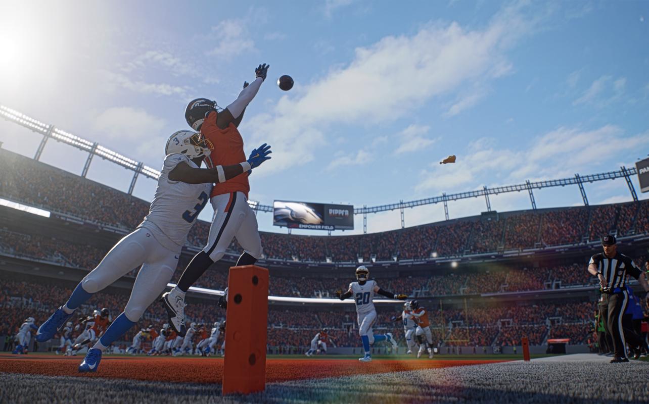 Madden NFL 27 gameplay showing a catch attempt in the end zone with bright stadium lighting and a full crowd.