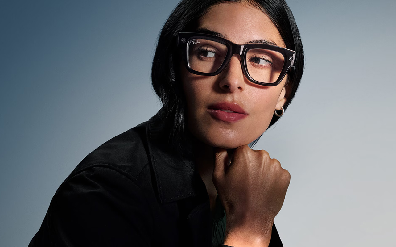 Woman wearing Meta Ray-Ban Display Glasses.