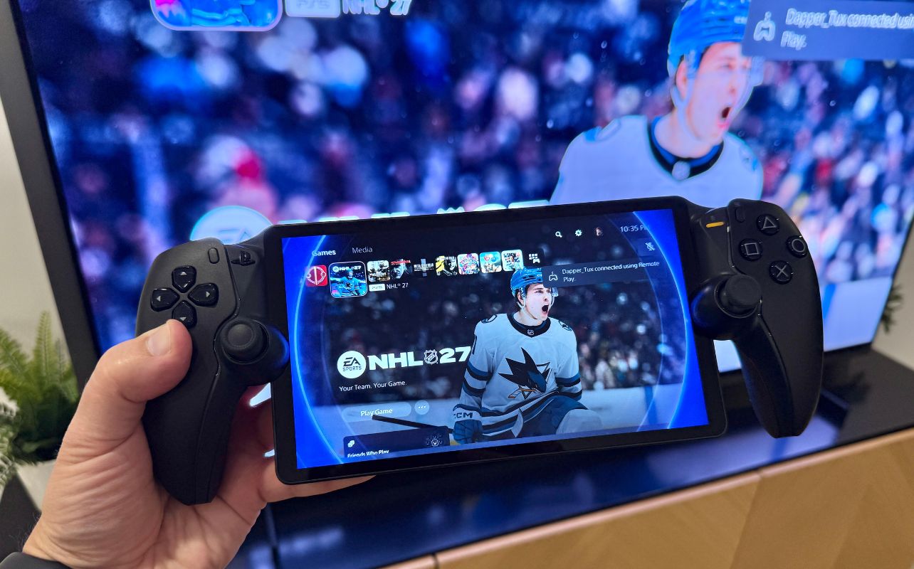 A PlayStation Portal in front of a Samsung TV playing NHL 27