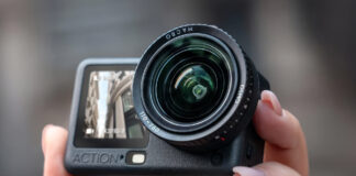 Close-up of person holding DJI Osmo Action 6 in hand.